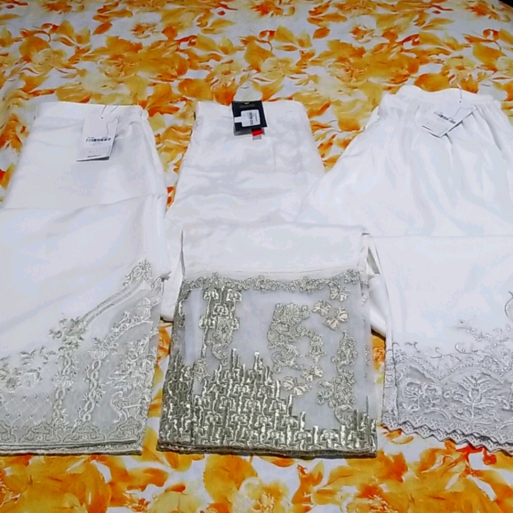 Three white trousers.